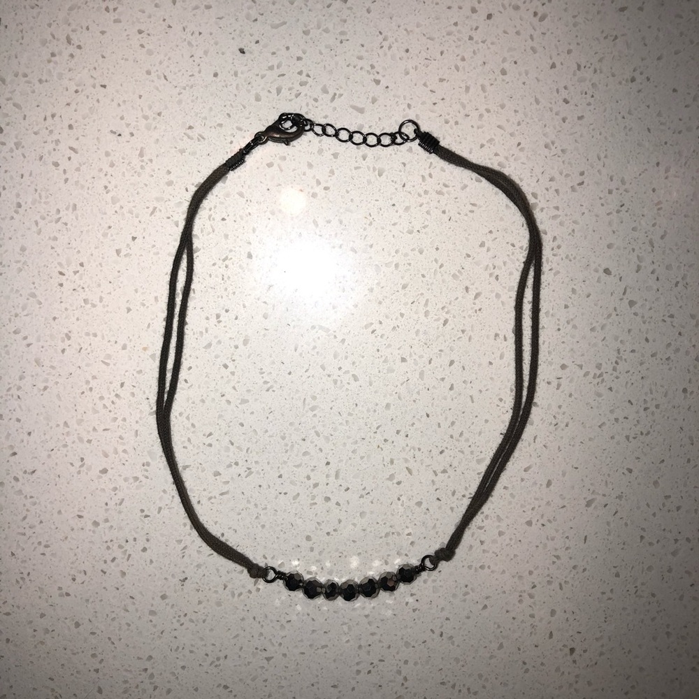grey string and beaded necklace